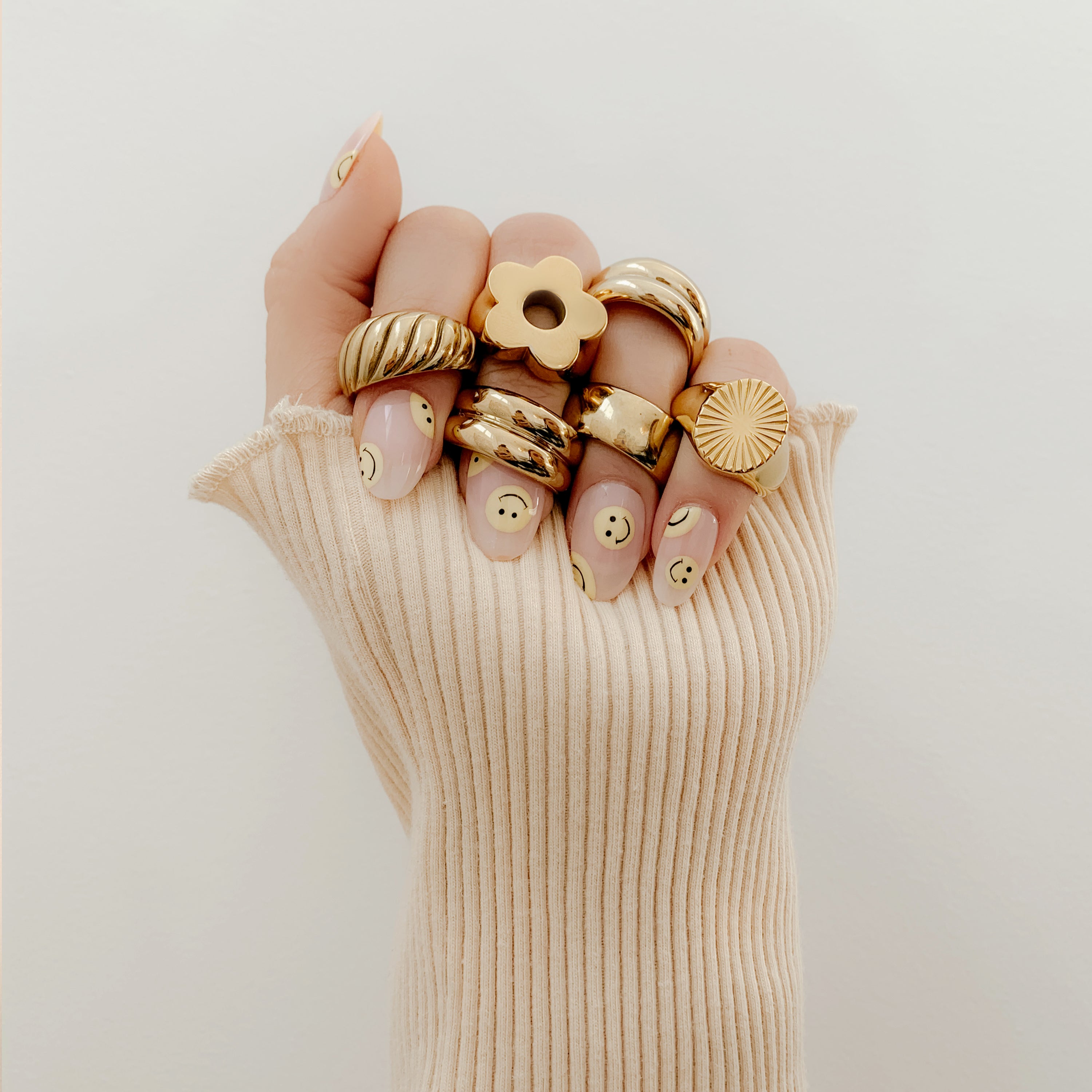 Model wearing Sugar Blossom rings