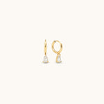 Small, "huggie" hoop style earrings with a drop cubic zirconia stone. 